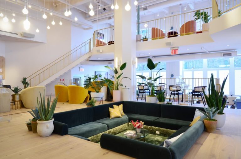 a living room with a large staircase